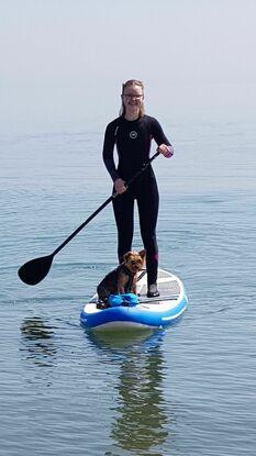 Tory and I paddleboarding at the beach in Kilcoole.
